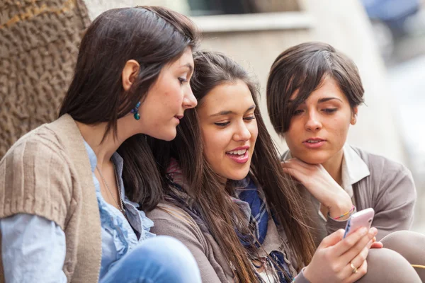 Group of Women Sending Message with Mobile Phone Stock Photo