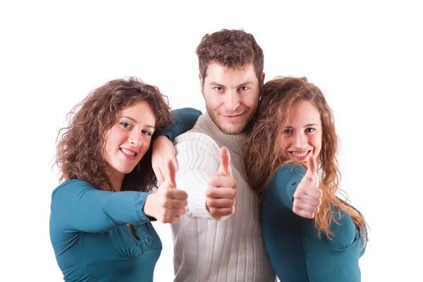 Drie gelukkige vrienden met Duimschroef opwaarts — Stockfoto