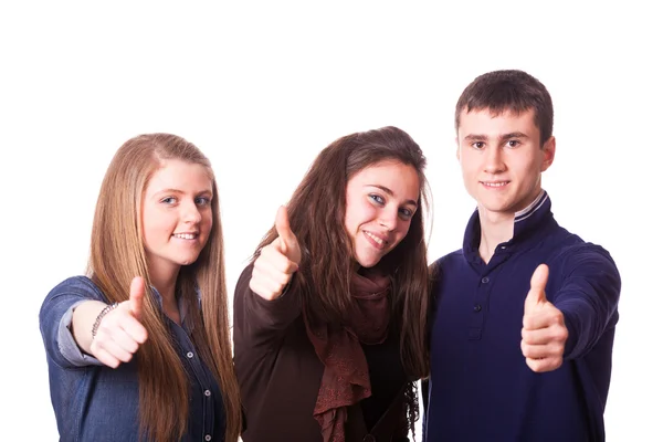 Подростки с поднятыми пальцами — стоковое фото