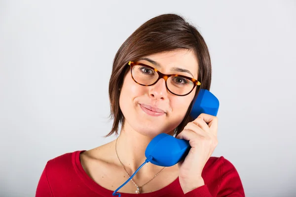 Fröhliche Frau mit Telefonhörer — Stockfoto