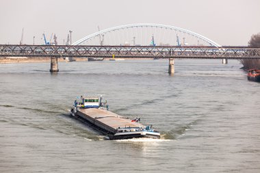 Big Barge Navigates Danub River in Bratislava clipart