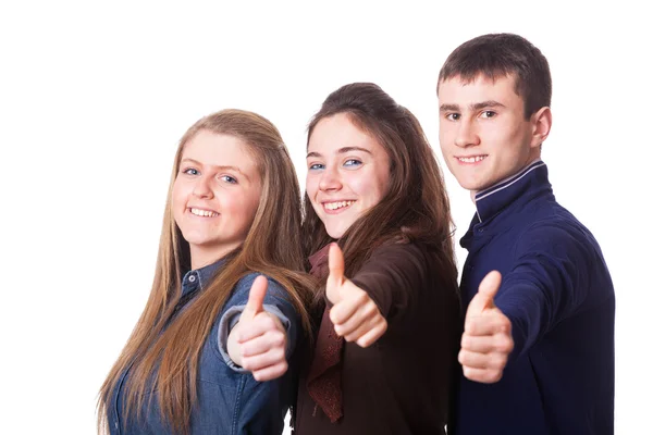 Estudantes adolescentes com polegares para cima — Fotografia de Stock