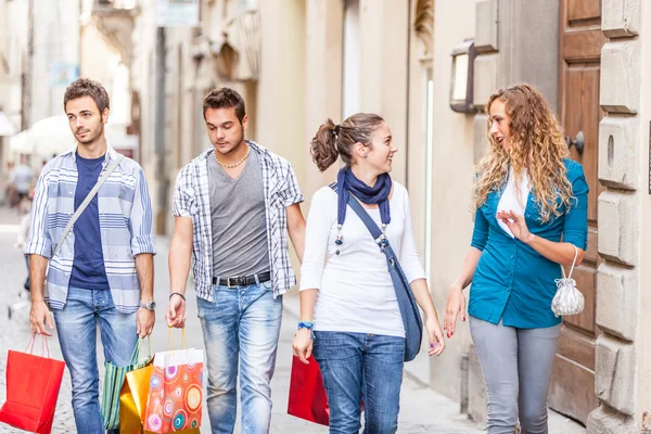 Happy Girls With Bored Boys on Shopping — Stock Photo, Image