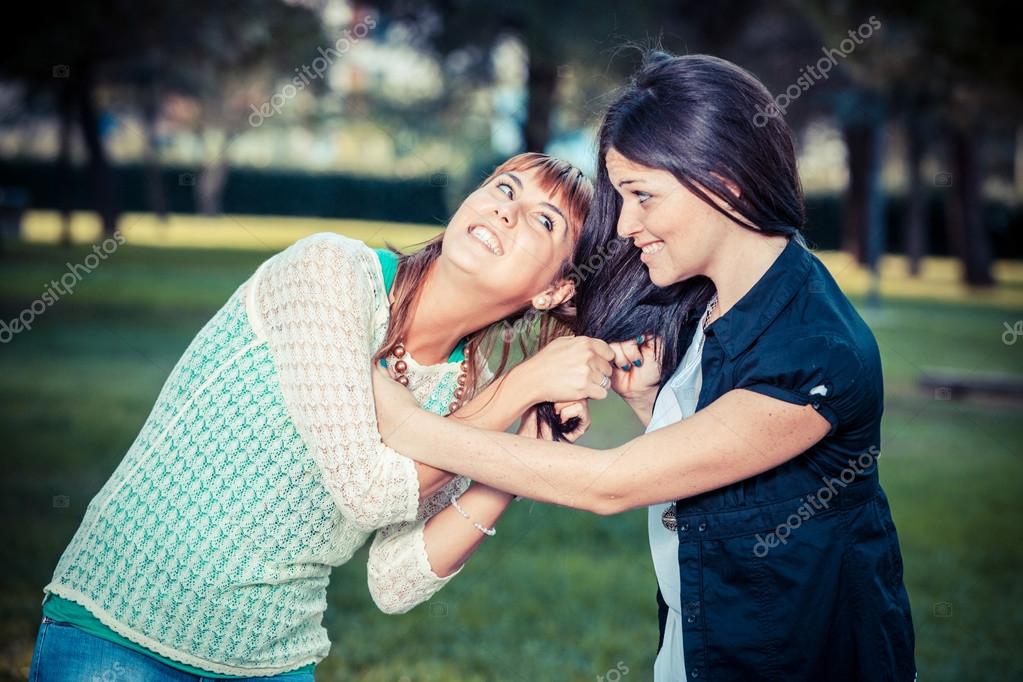 Two young women fighting — Stock Photo © william87 25974259
