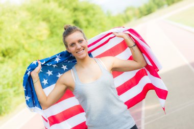 Beautiful Young Woman with USA Flag clipart