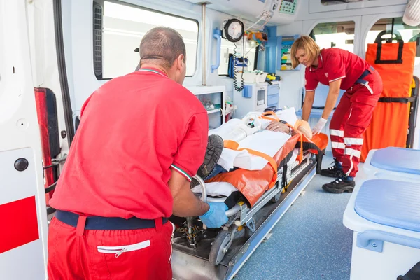 Rescue Team Providing First Aid — Stockfoto