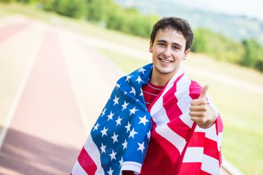 ulusal bayrak ile ABD'li atlet