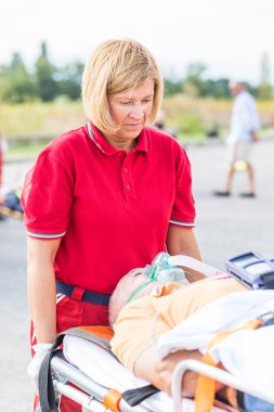 Rescue Team Providing First Aid