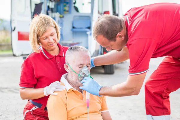 Rescue Team Providing First Aid — Stockfoto