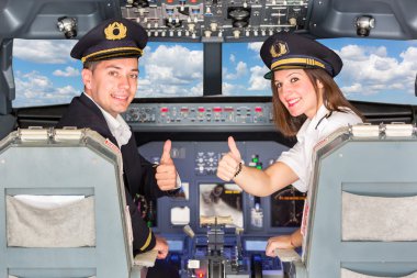 başparmak yukarıya ile kokpit mutlu pilotu