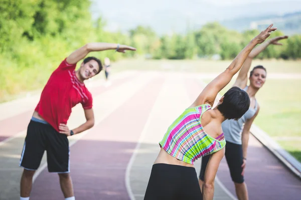 Group of People doing Stretching Exercises — Stock Photo, Image