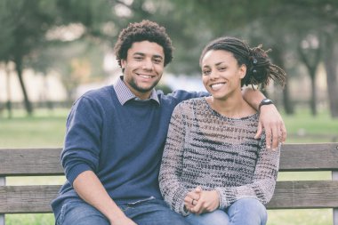 Mixed-Race Couple Outdoor Portrait clipart