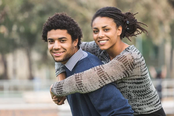 Mixed-Race Couple, Piggyback — Stock Photo, Image