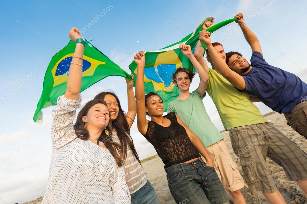 Friends with Brazilian Flag at Beach