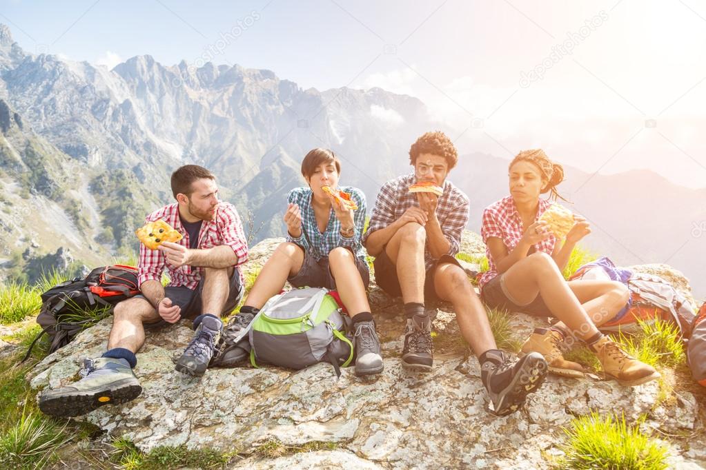 People Having a Rest at top of Mountain