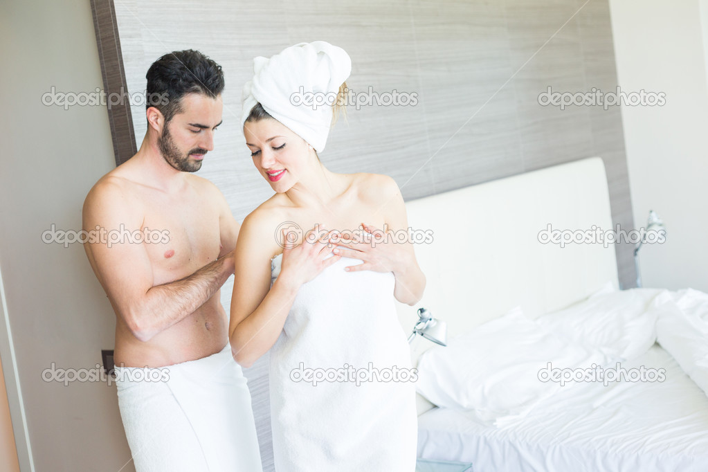 Young Couple at Hotel Room after Shower