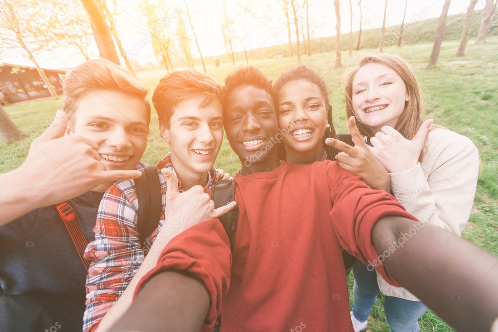 Group of Multiethnic Teenagers Taking a Selfie