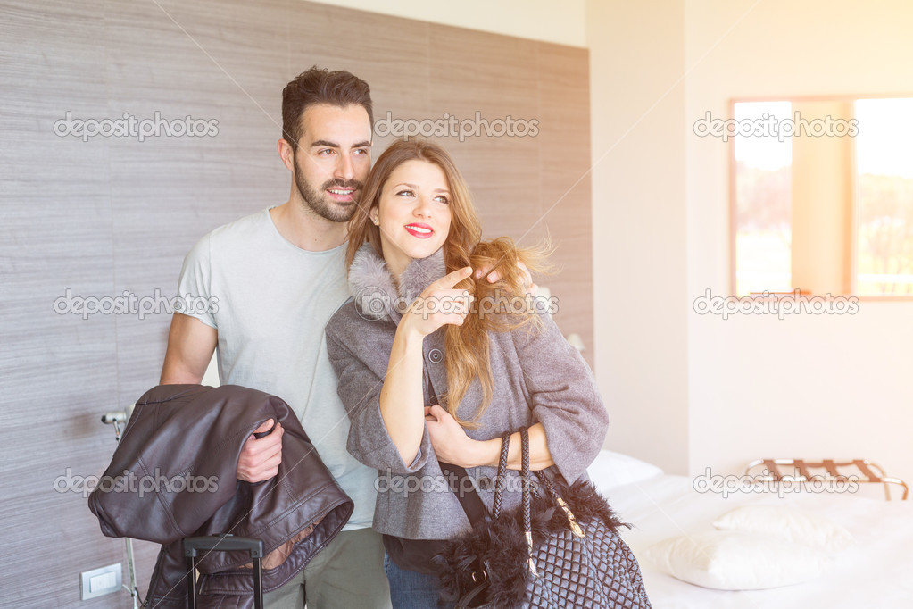 Couple embracing at Room
