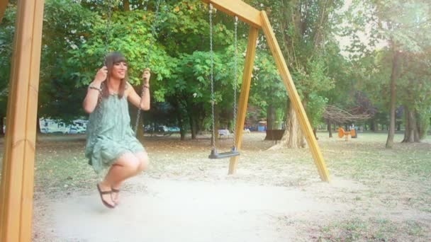 Young Woman Having Fun on the Swing — Stock Video