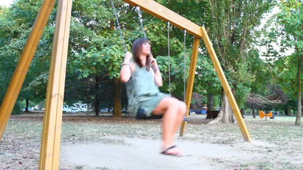 Young Woman Having Fun on the Swing — Stock Video