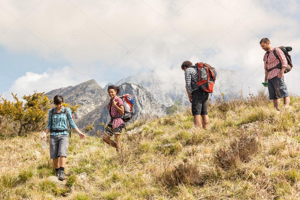 People Hiking at Top of Mountain