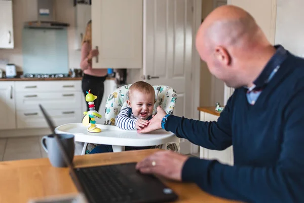 Authentic Home Shot Young Father Working Home Playing His Newborn — Stock Photo, Image