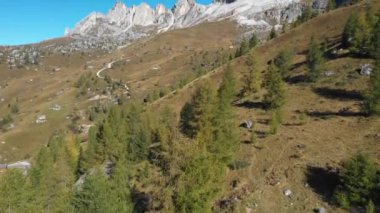 Aerial and panoramic view of Dolomites mountains in the Alps in Italy on a sunny day - Nature and travel concepts with beautiful scenery