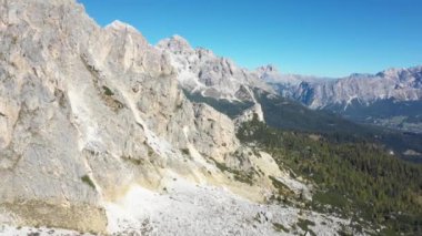 Aerial and panoramic view of Dolomites mountains in the Alps in Italy on a sunny day - Nature and travel concepts with beautiful scenery