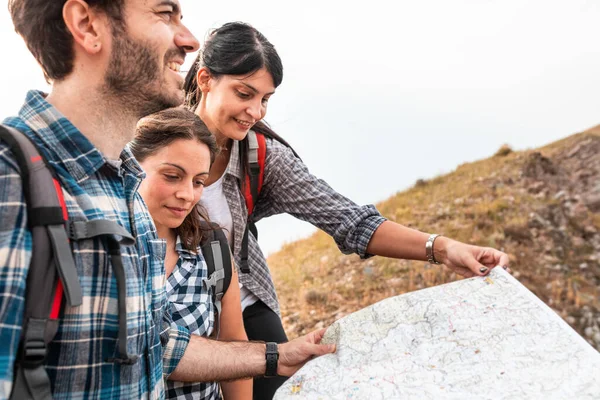 Group People Hiking Looking Map Adventure Authentic Man Two Women — Stock Photo, Image