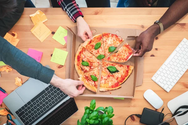 Friends Sharing Pizza Startup Home Office Coworking Space Multiracial Group — стоковое фото