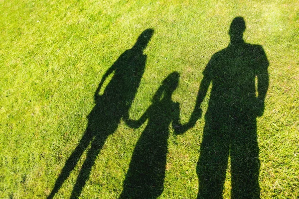 Shadow Family Mother Father Daughter Holding Hands Together Park Green — Φωτογραφία Αρχείου