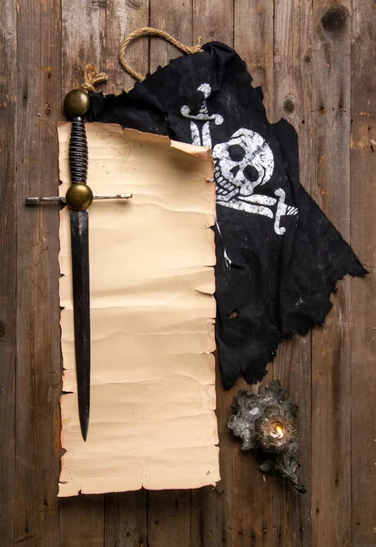 Pirate Still Life Jolly Roger Flag Top View Blank Scroll — стоковое фото