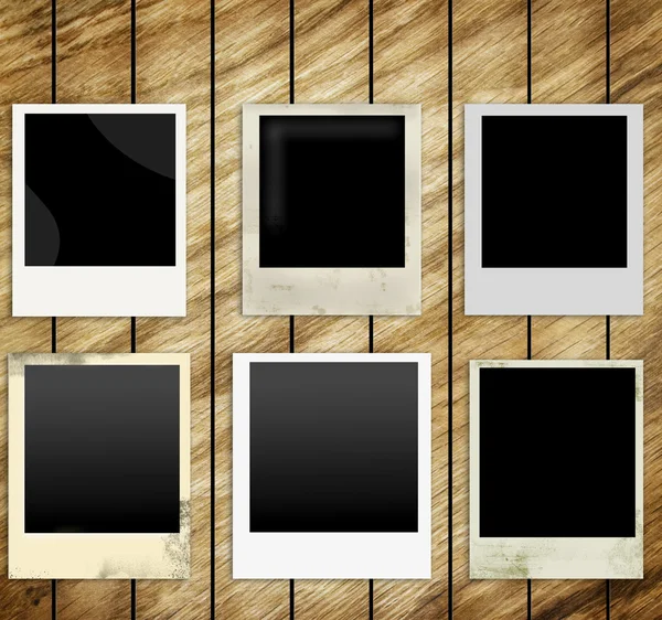 Old Polaroid Frames on wood background — Stock Photo, Image