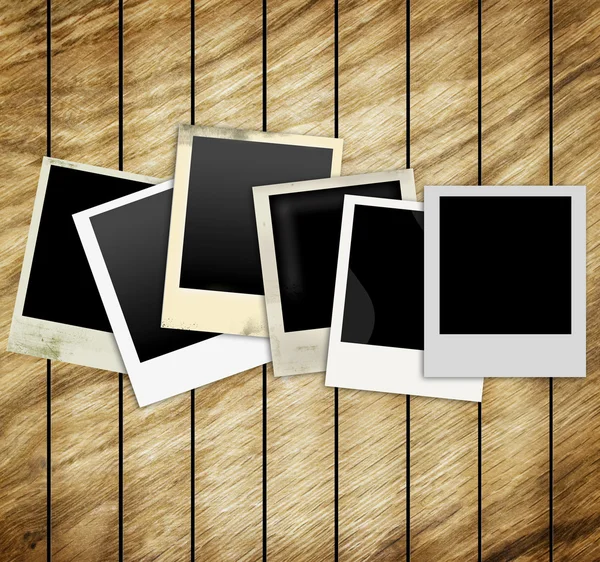 Old Polaroid Frames on wood background — Stock Photo, Image
