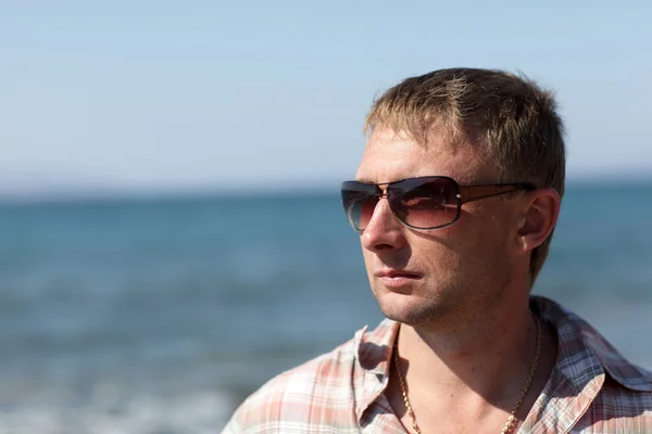 Man on sea background — Stock Photo, Image