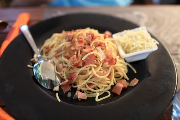 Spaghetti with ham — Stock Photo, Image