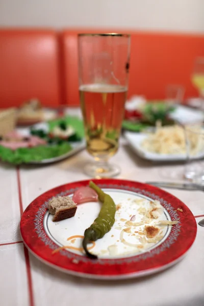 Pickled peppers and leftover food — Stock Photo, Image