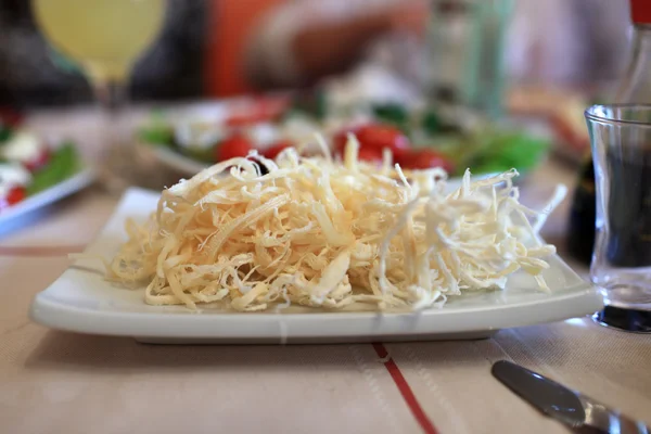 Plate with dried squid — Stock Photo, Image