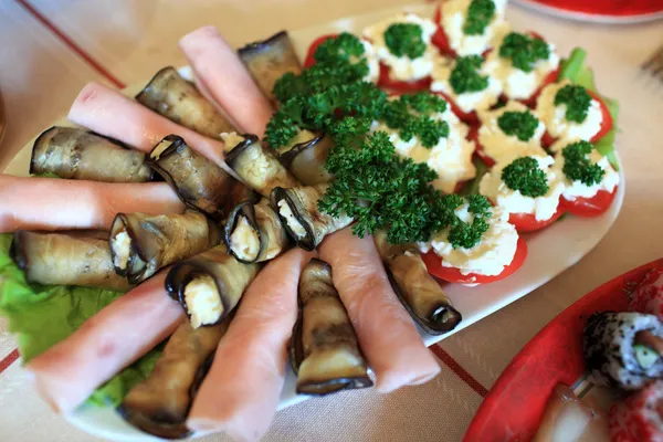 Cheese wrapped in eggplant — Stock Photo, Image