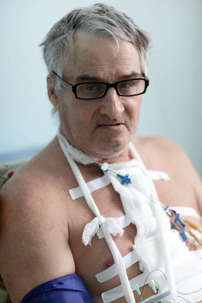 Patient with white bandage on chest — Stock Photo, Image