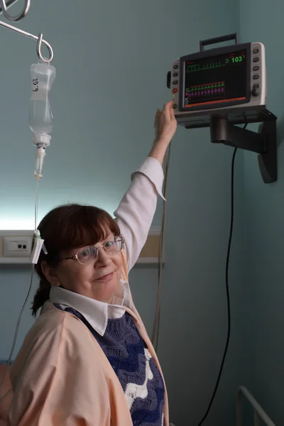 Nurse and patient monitor — Stock Photo, Image