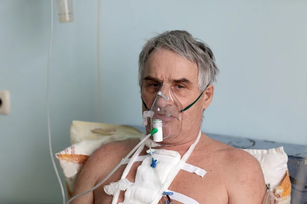 Person with oxygen mask — Stock Photo, Image