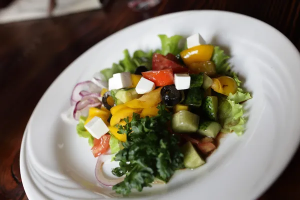 Plate of greek salad — Stock Photo, Image