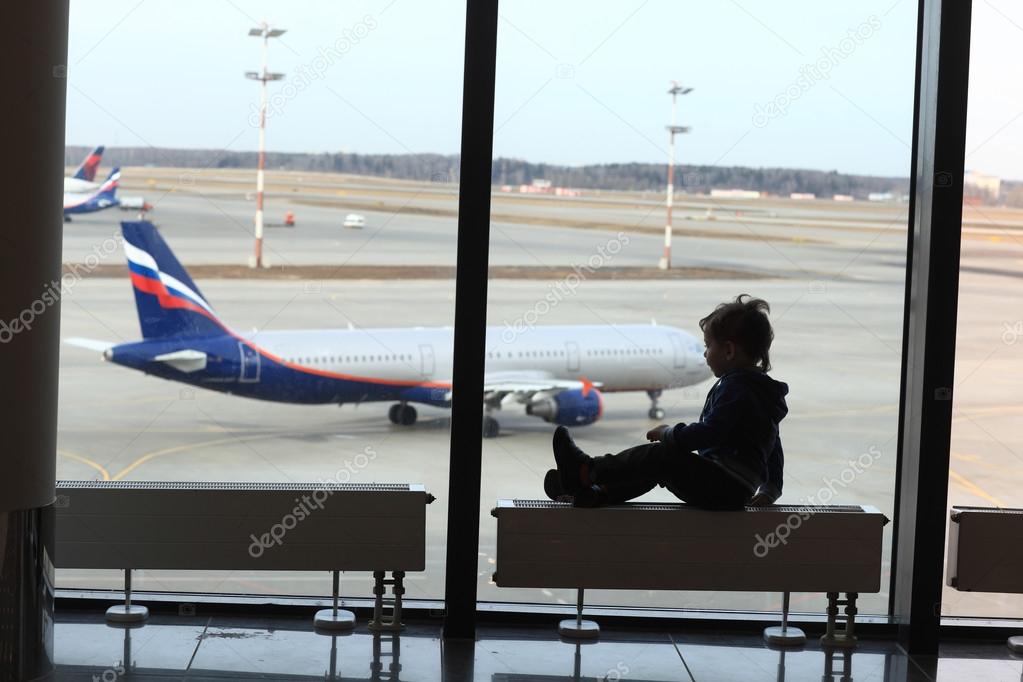 Boy looking at aircraft