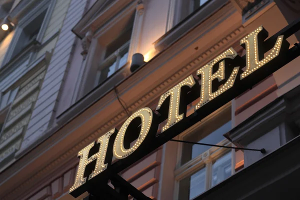 Illuminated hotel signboard — Stock Photo, Image