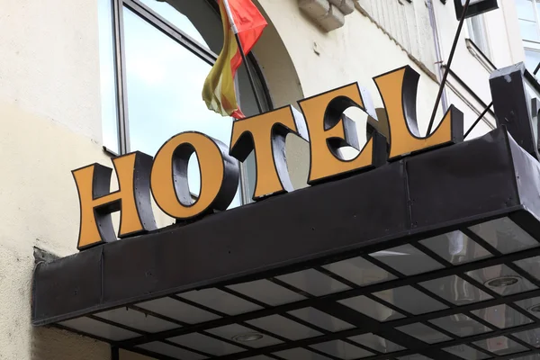 Yellow hotel sign — Stock Photo, Image