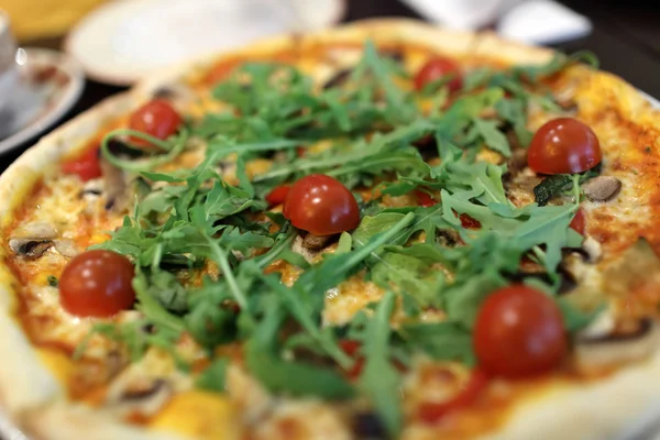 Pizza with arugula — Stock Photo, Image
