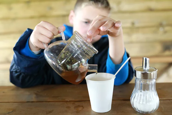 Kid Pouring Herbal Tea Restaurant Terrace — Stock Photo, Image