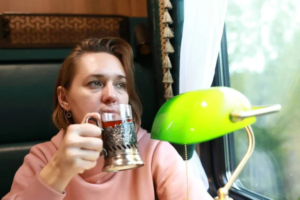 Portrait Woman Drinking Tea Retro Train Compartment — Stock Photo, Image