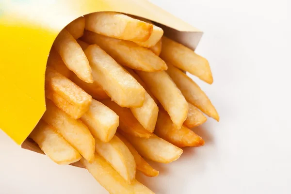 French fries on a white background — Stock Photo, Image